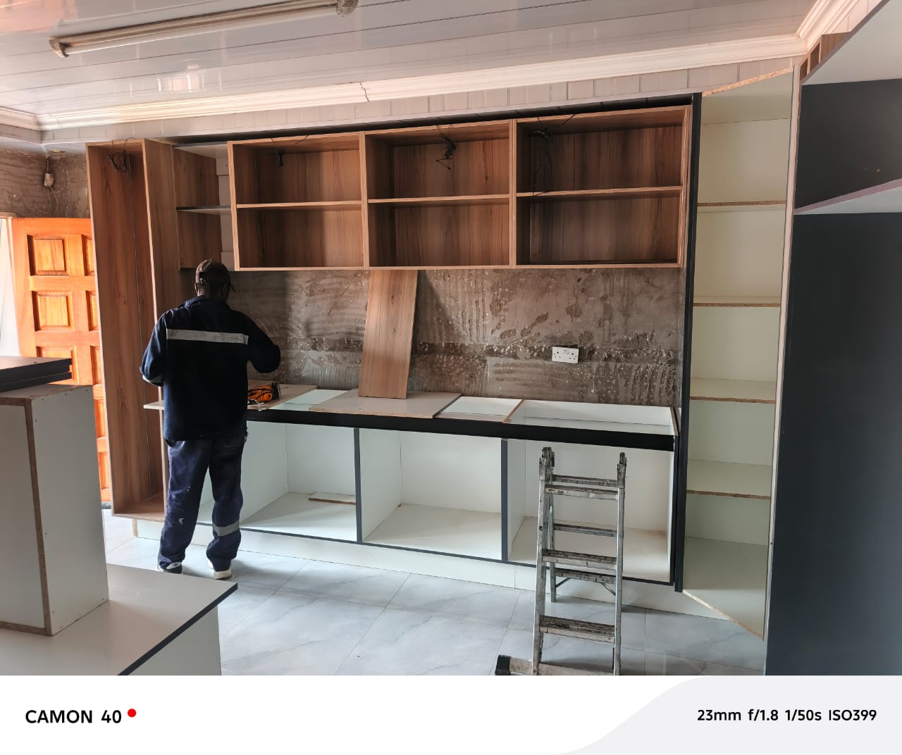 Craftsman sanding hardwood in the Maqmatt Gaborone workshop